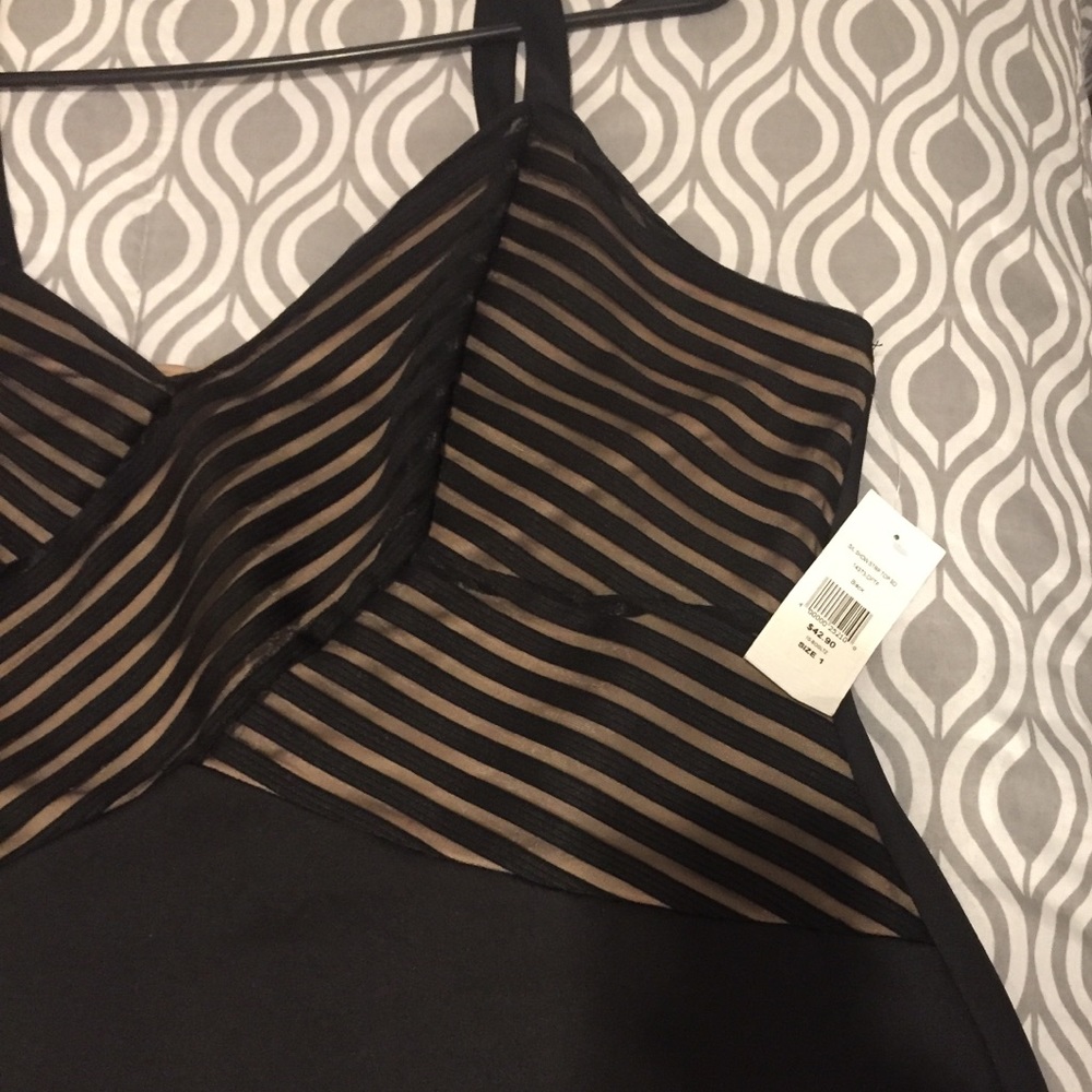 Black Fashion to Figure dress, tan mesh on top. 1x